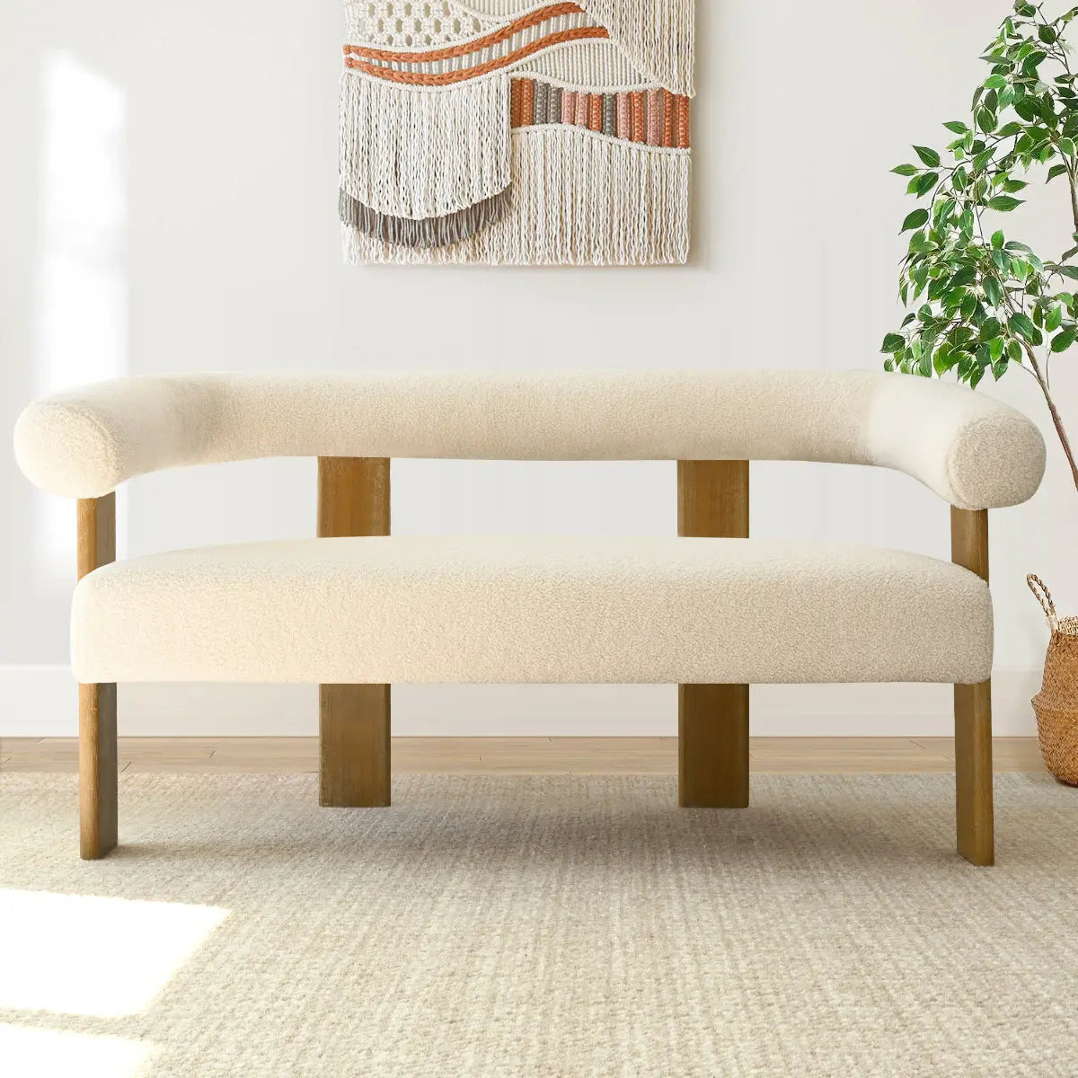 Maye Modern Beige Loveseat Sofa in cozy living room, light rug, woven wall art, plant decor.