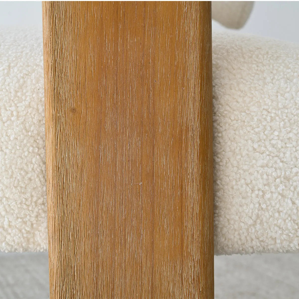 Close-up of Maye Modern Beige Upholstered Loveseat Sofa with wood texture detail.