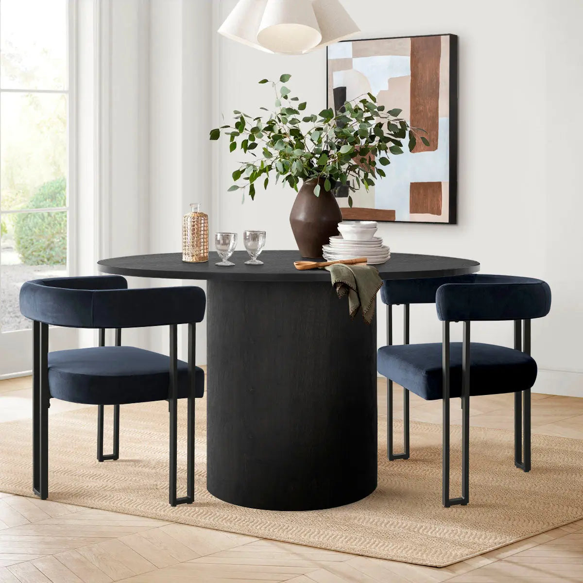 Mia Velvet Accent Dining Chair with dark wood table, beige walls, and light wood flooring in dining room.