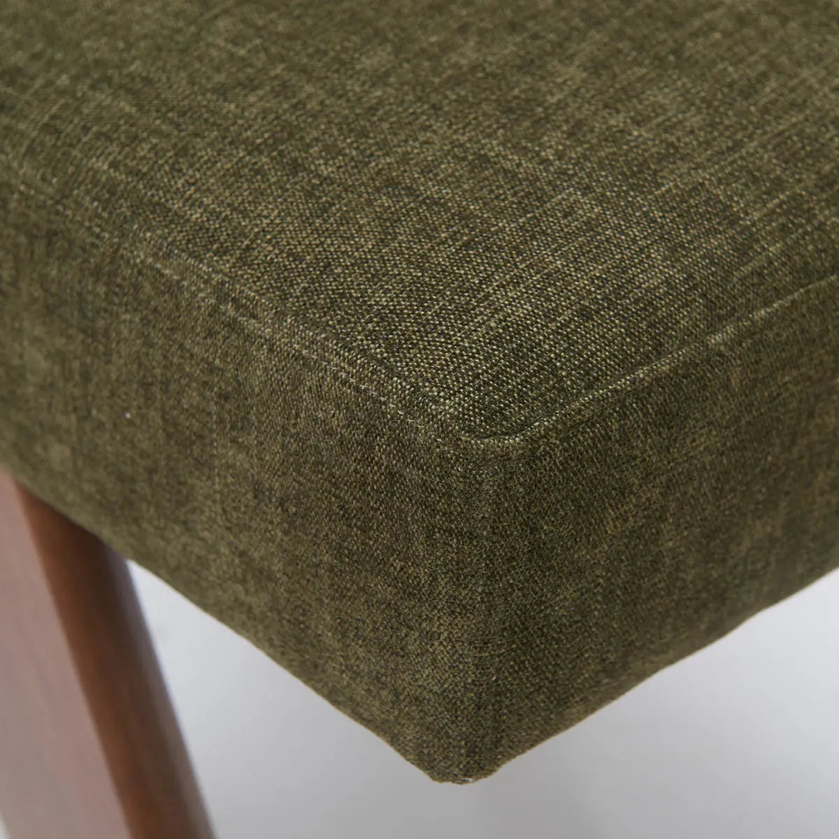 Morgan Mid Century Modern Upholstered Dining Chair, olive green fabric, walnut legs, close-up view.