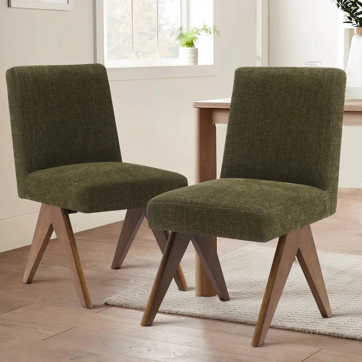 Morgan Mid Century Modern Upholstered Dining Chair set in dining room, wooden floor, neutral walls.