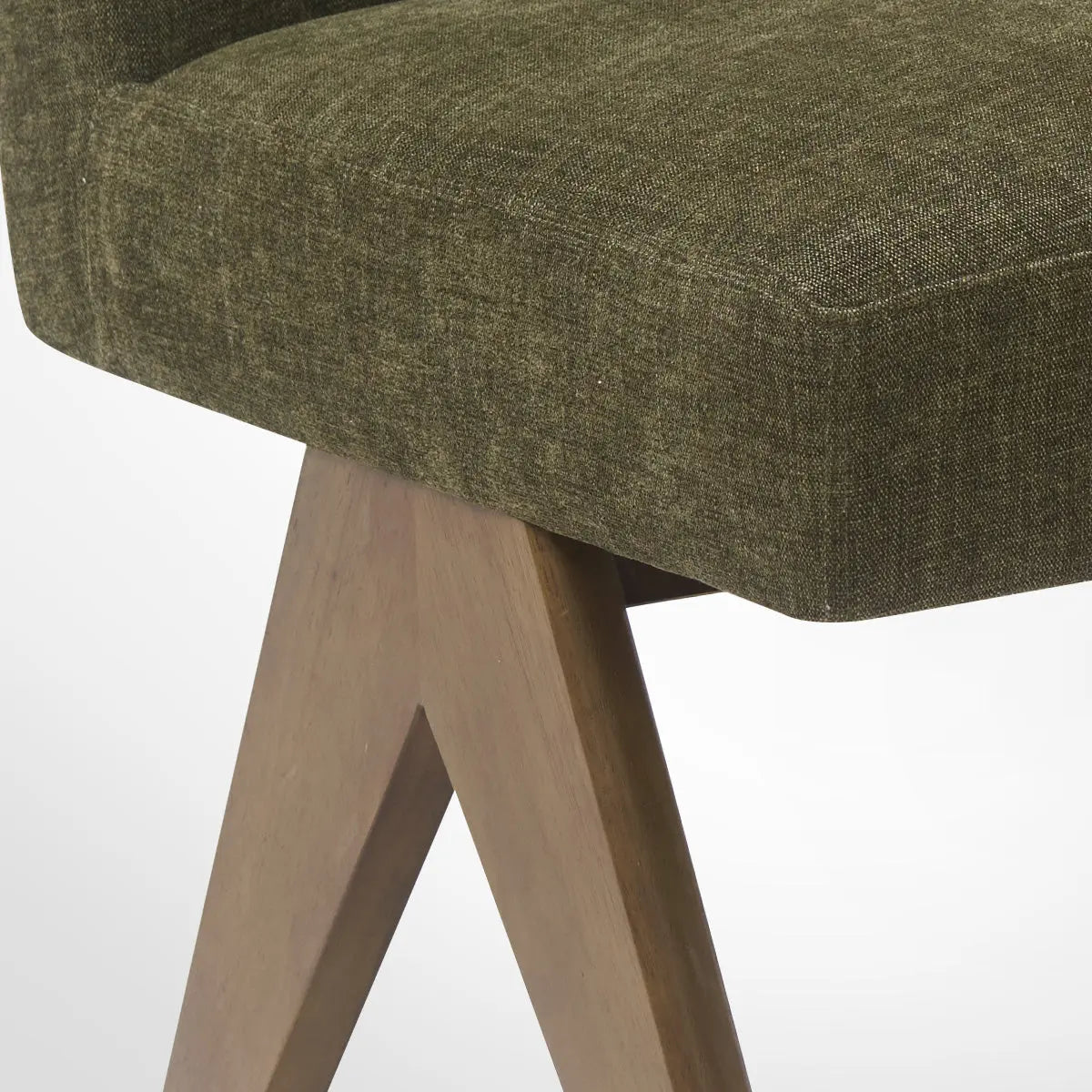 Morgan Mid Century Modern Upholstered Dining Chair close-up with wood legs. Brown upholstery fabric.