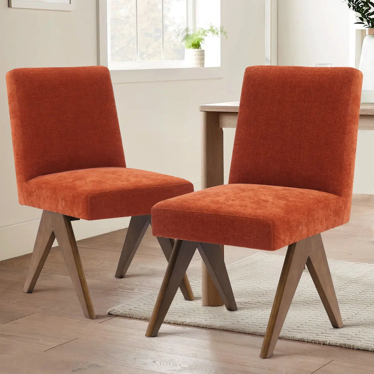 Morgan Mid Century Modern Upholstered Dining Chair in dining room, wood table, oak flooring.