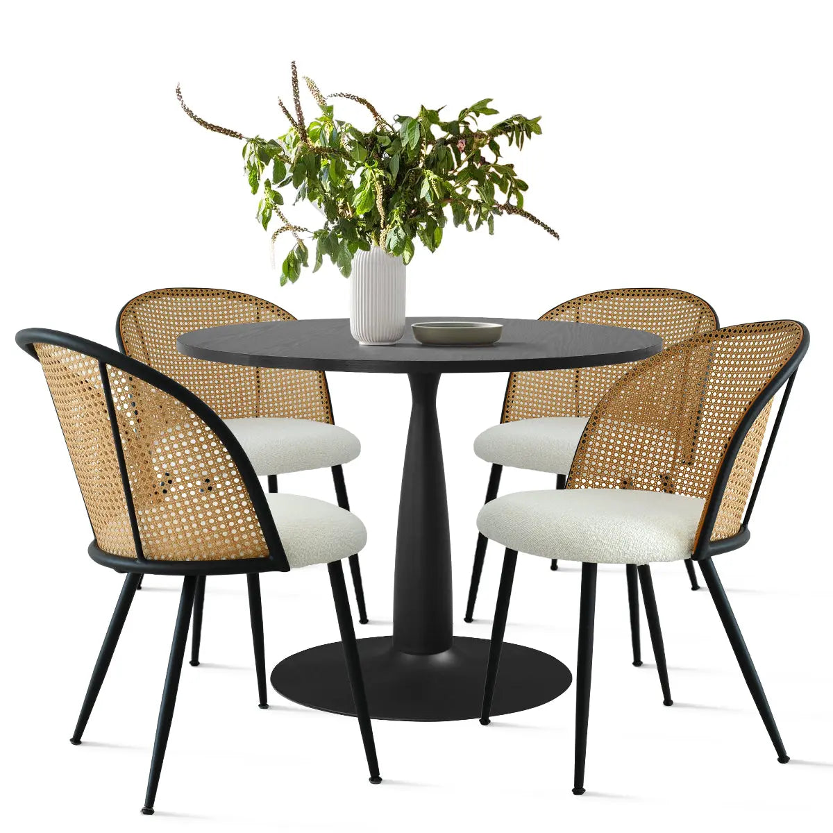 Haven & Jules rattan dining table set with curved chairs; elegant addition to modern dining rooms.