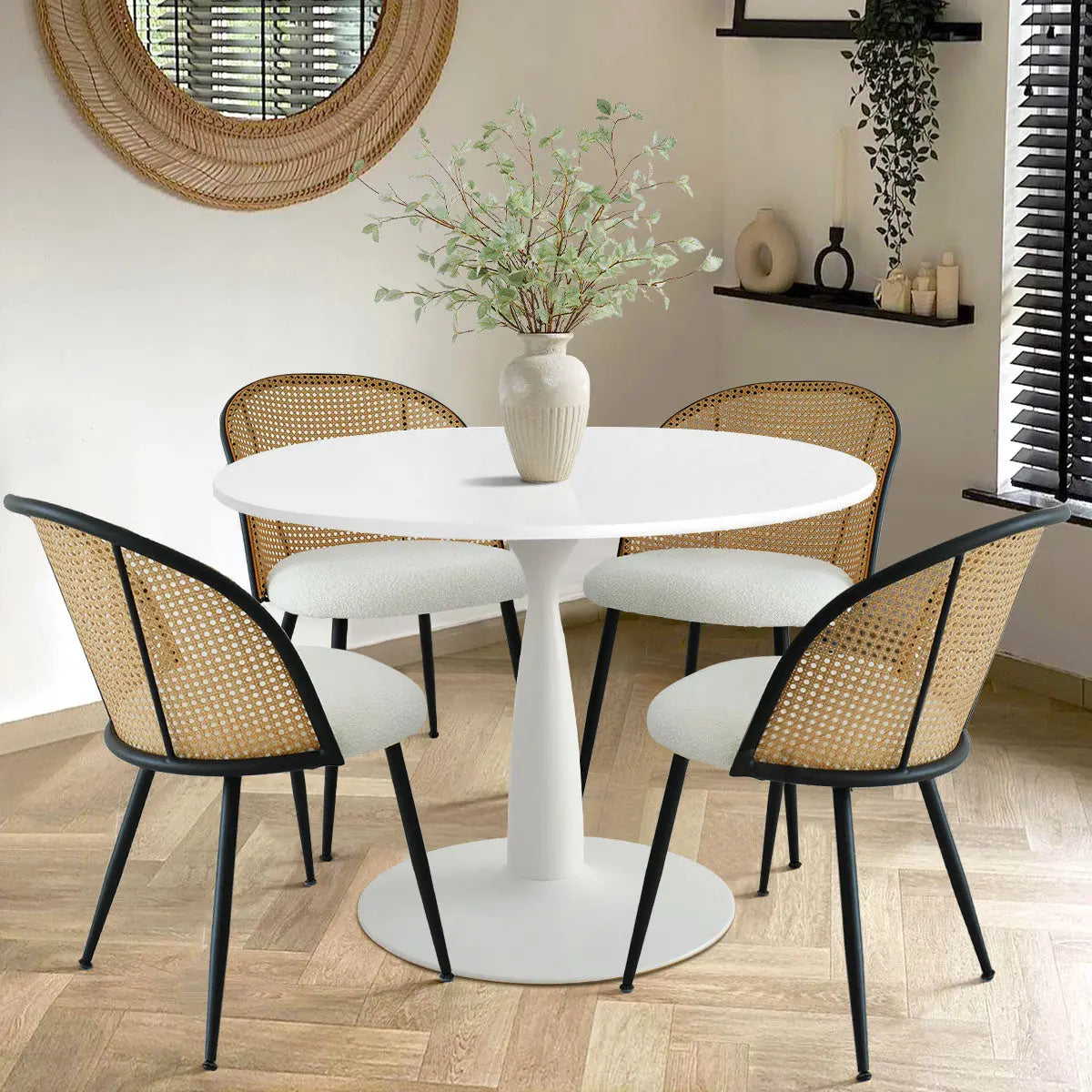 Haven & Jules Rattan Dining Set in modern dining room with wood flooring and wall decor.