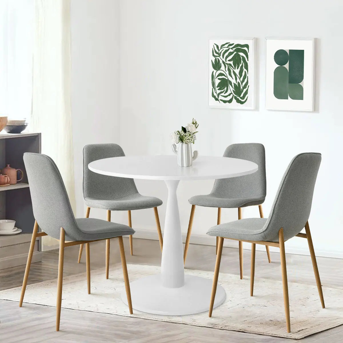 Haven & Oslo white dining set, gray chairs, wooden legs, modern art, light wooden floor, dining room.