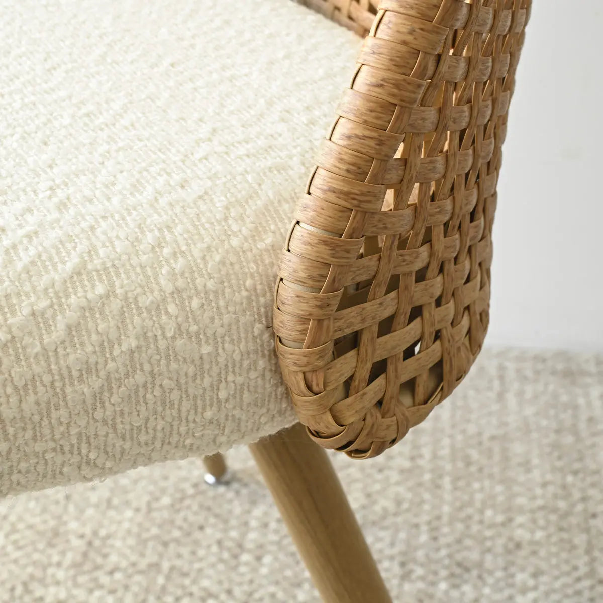 Nice Rattan Upholstered Dining Chair close-up with woven texture and light, textured upholstery detail.