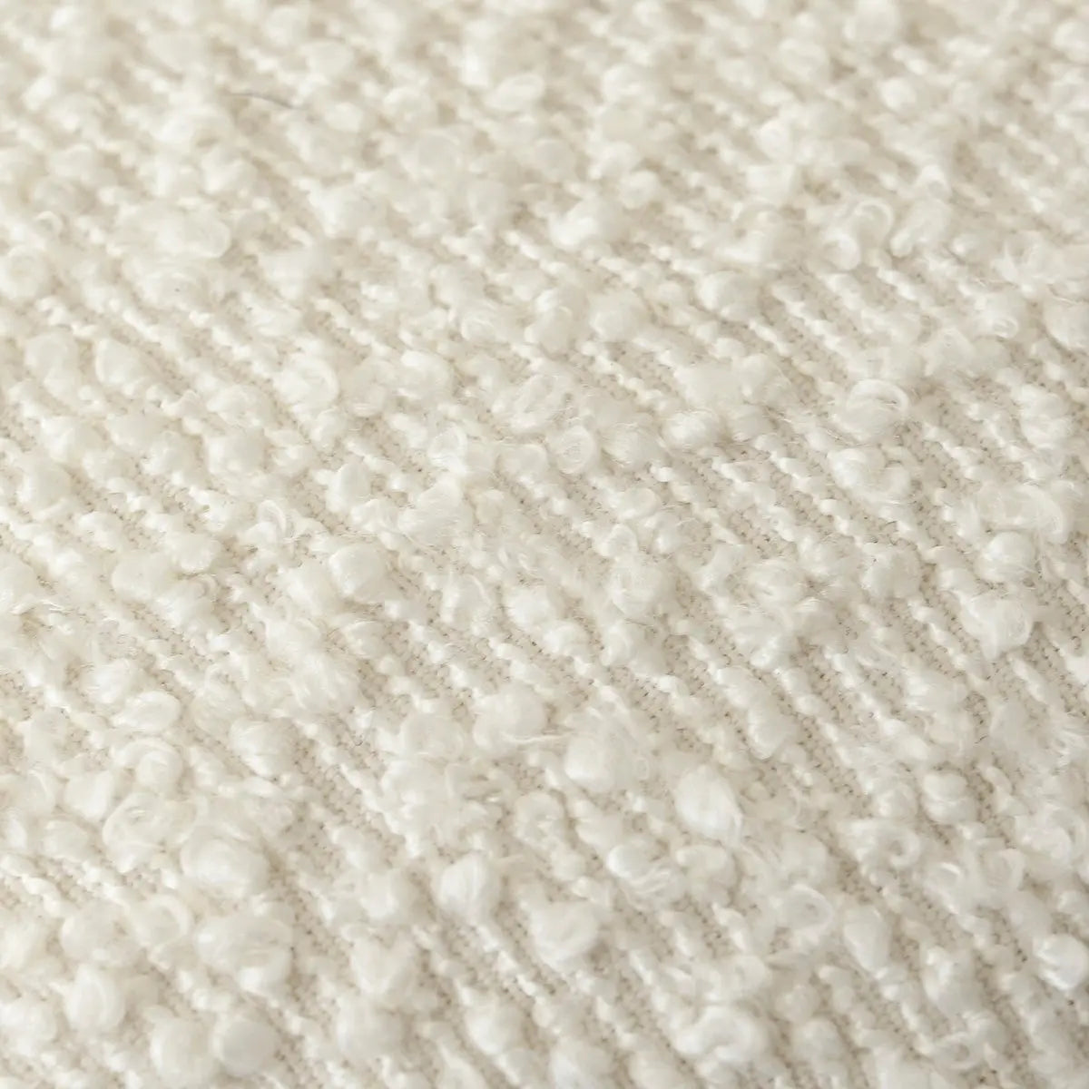 Close-up texture of the upholstered fabric on Nice Rattan Counter Stool, featuring a soft, textured pattern.