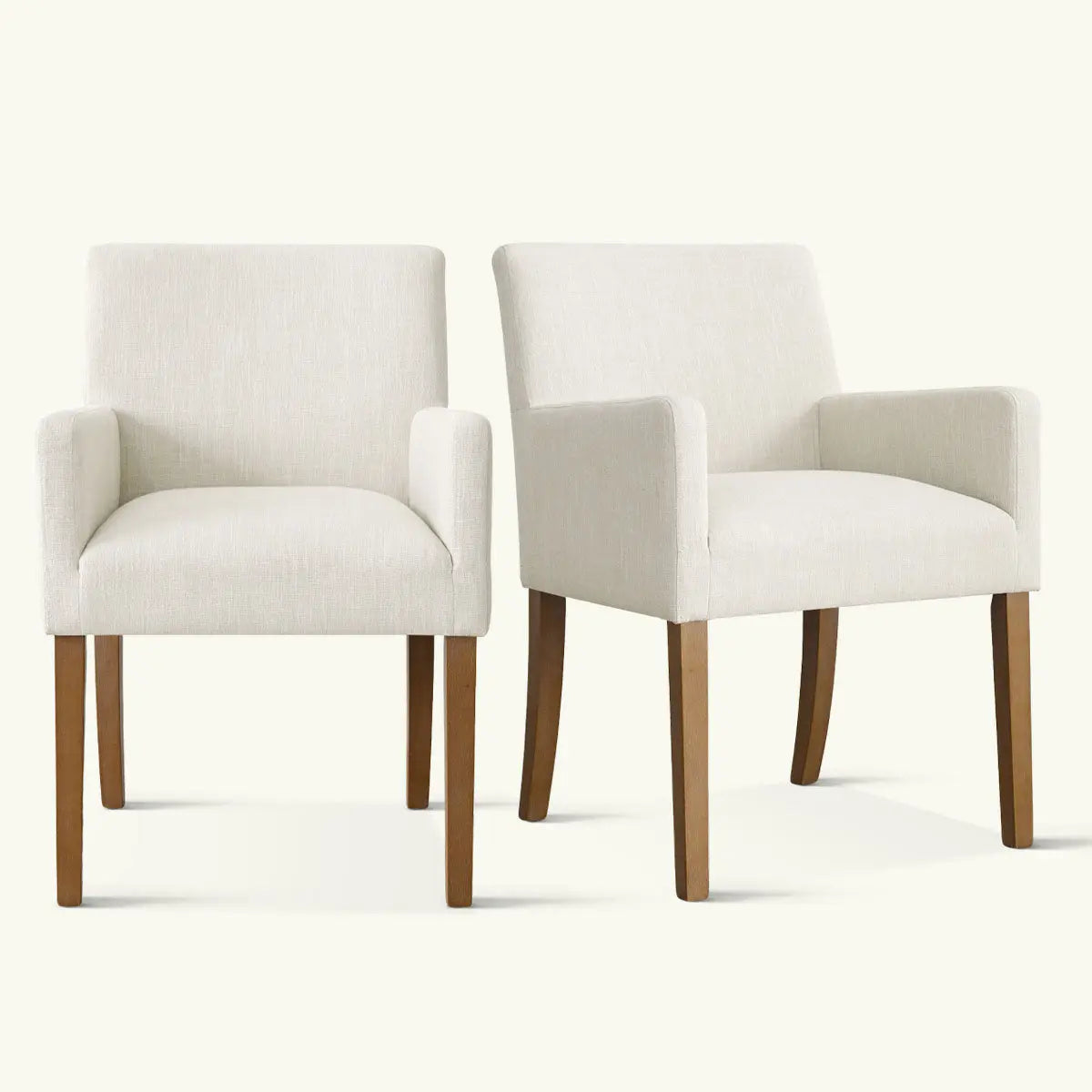 Pair of North Modern Boucle Armchairs with wooden legs, beige upholstery on light background.