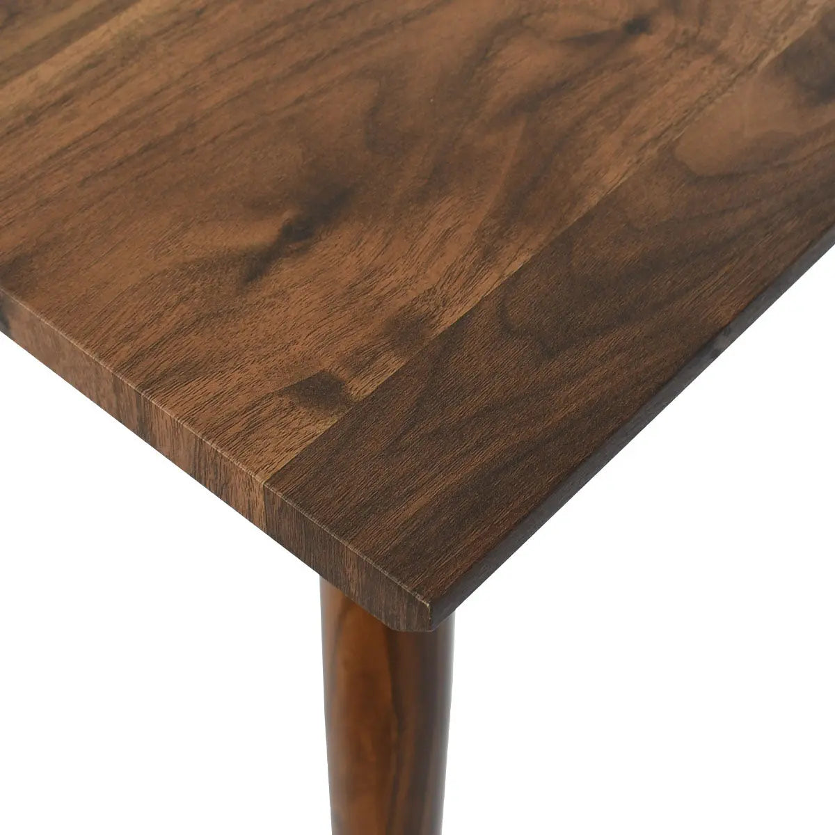 Close-up of Odense Extendable Rectangular Dining Table corner, showcasing dark wood grain texture.