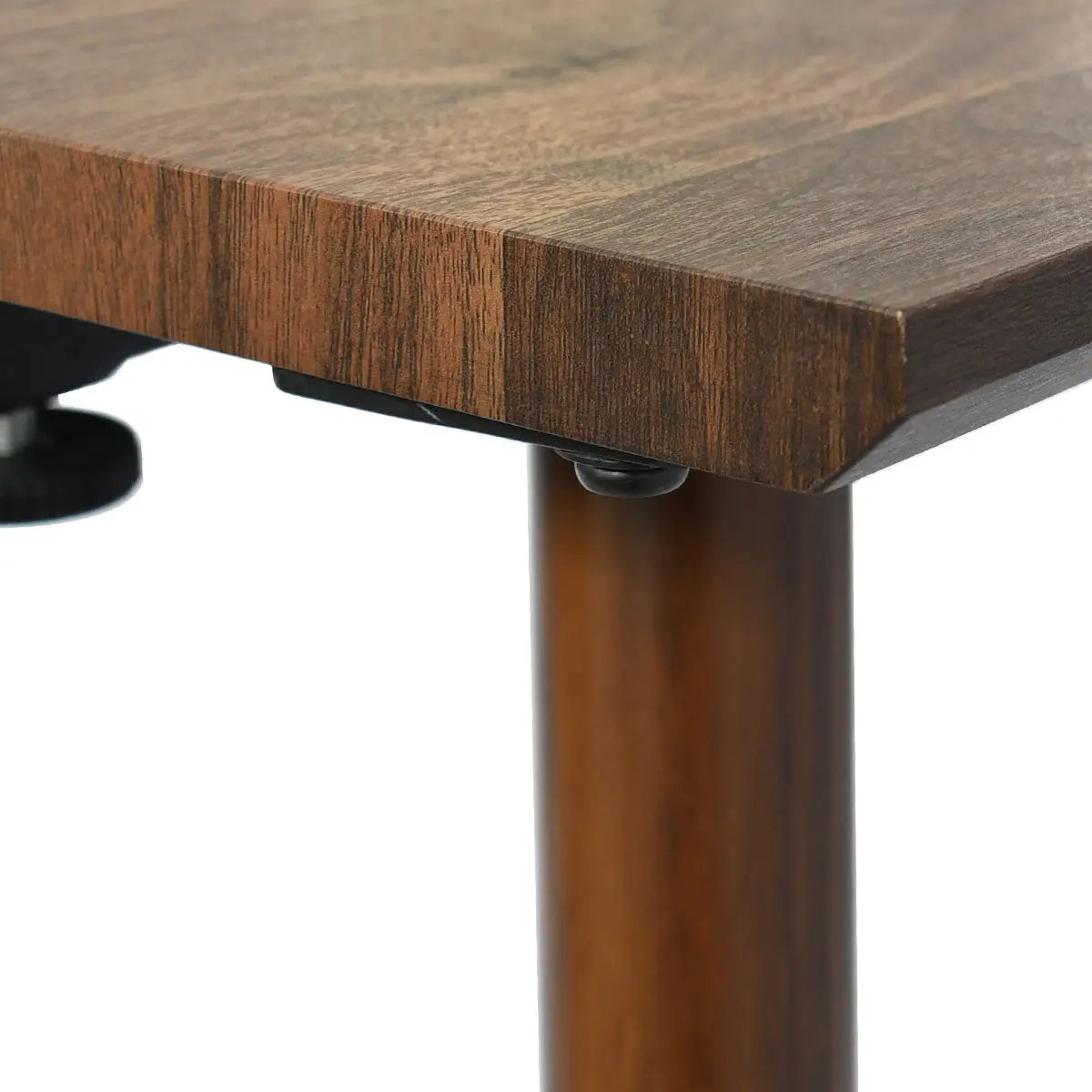 Close-up of Odense Extendable Rectangular Dining Table's wood finish and leg design detail.