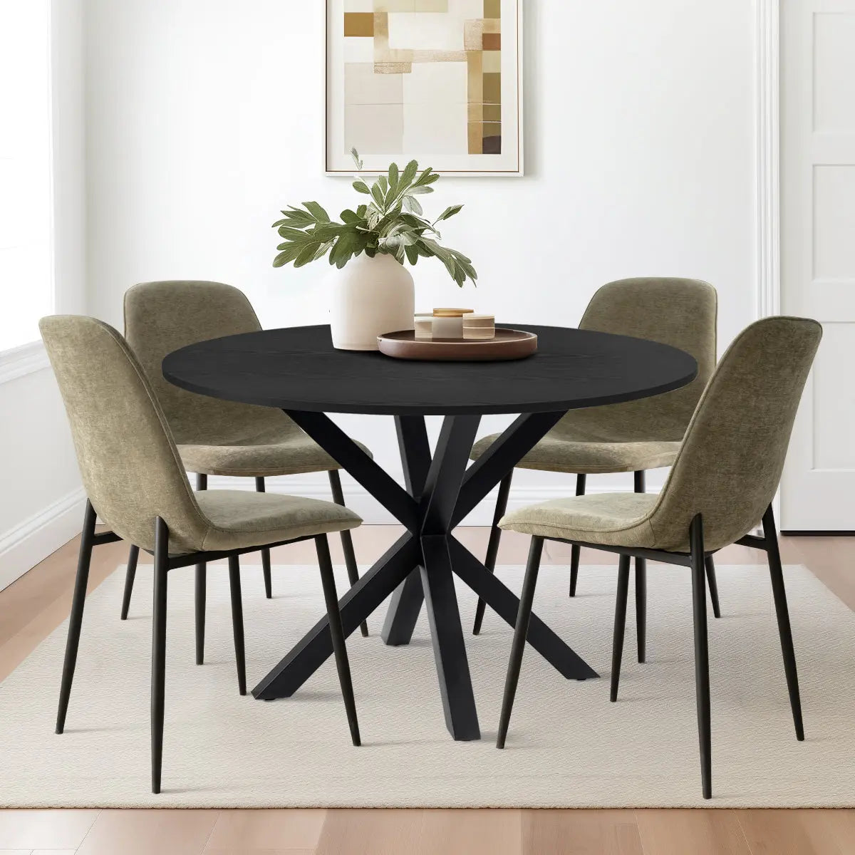 Oliver & Oslo Round Dining Table Set, beige chairs, light wood flooring, minimalist dining room style.