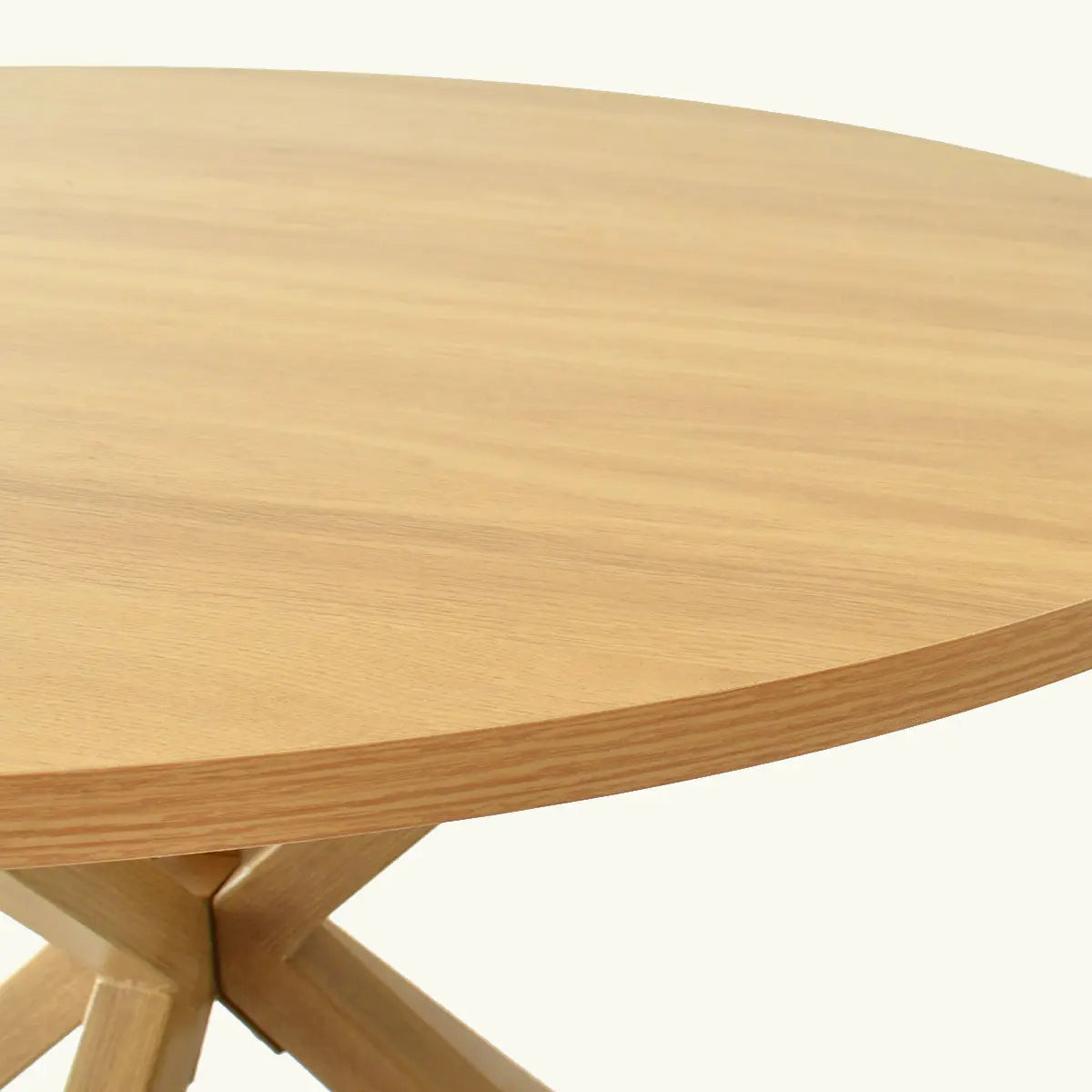 Oliver Modern Round Dining Table, wooden surface close-up, simple elegant room furniture design.