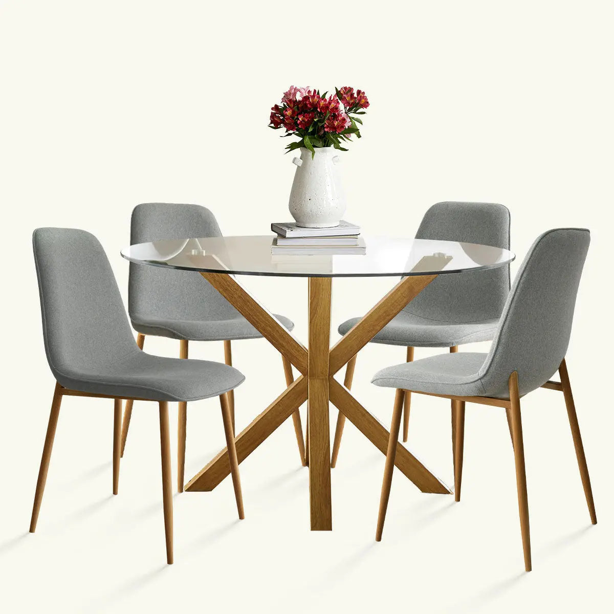 Oliver & Oslo Glass Round Dining Table Set, grey chairs, wooden base, in dining room setting.