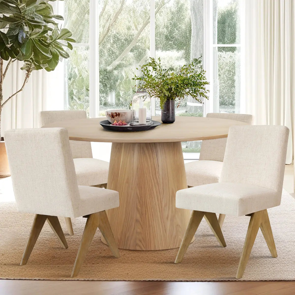 Orchid & Morgan oak dining set with beige chairs on hardwood floor in bright dining room.