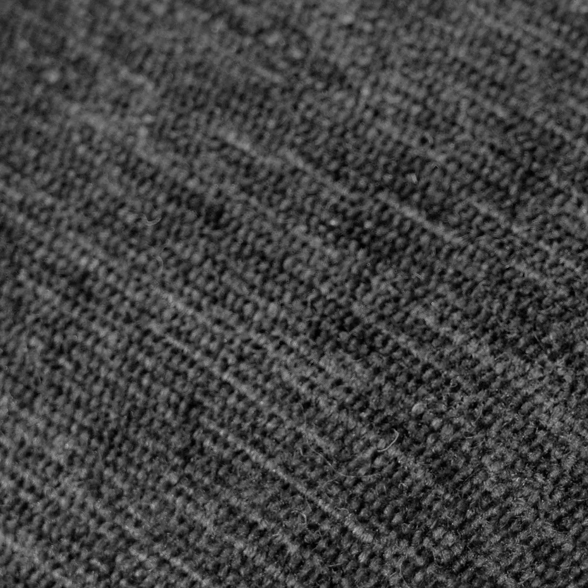 Close-up view of textured fabric in black upholstery for Oslo Modern Dining Chair with Metal Legs.