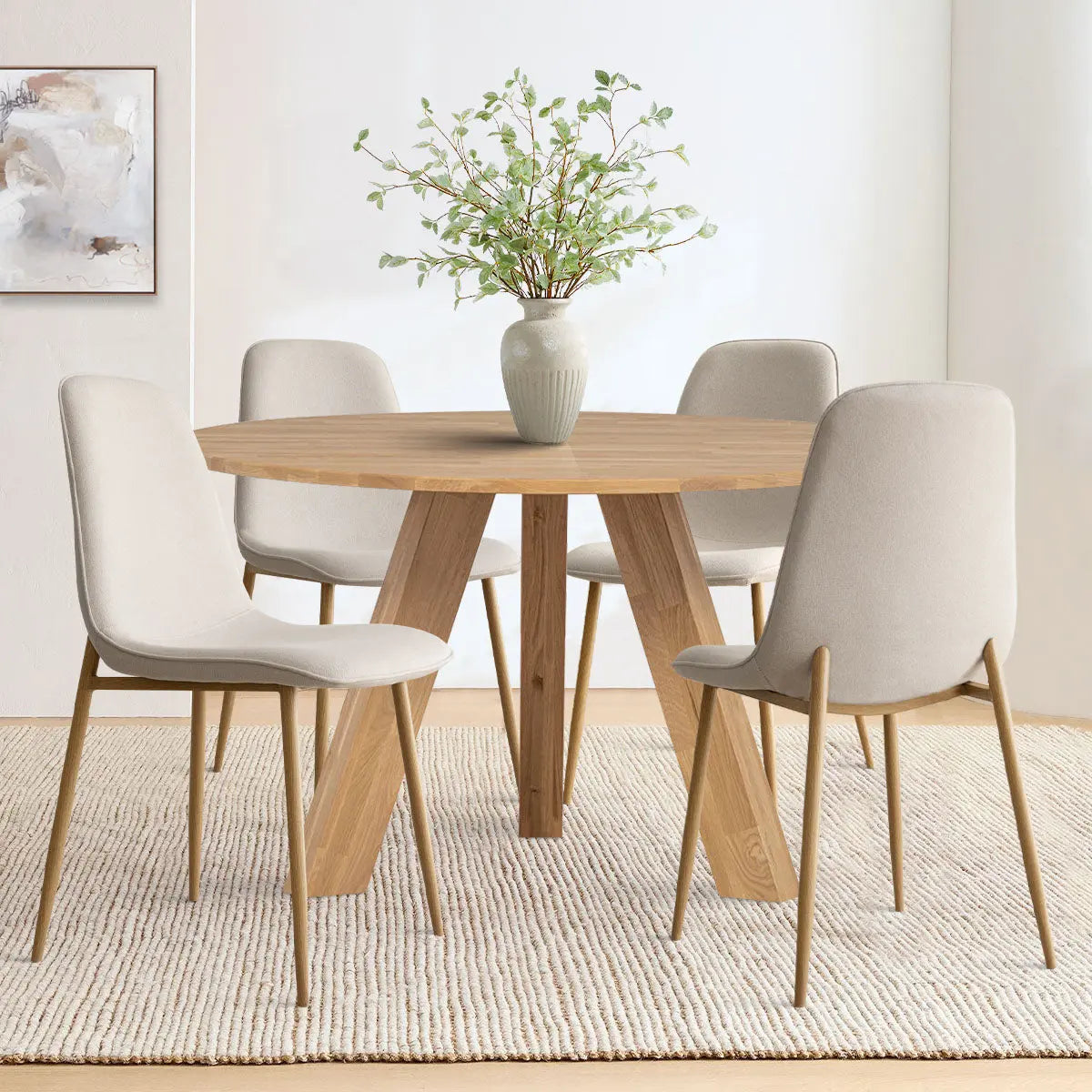 Oslo Modern Chenille Dining Chair with Oak Legs around wooden table on beige rug in dining room.