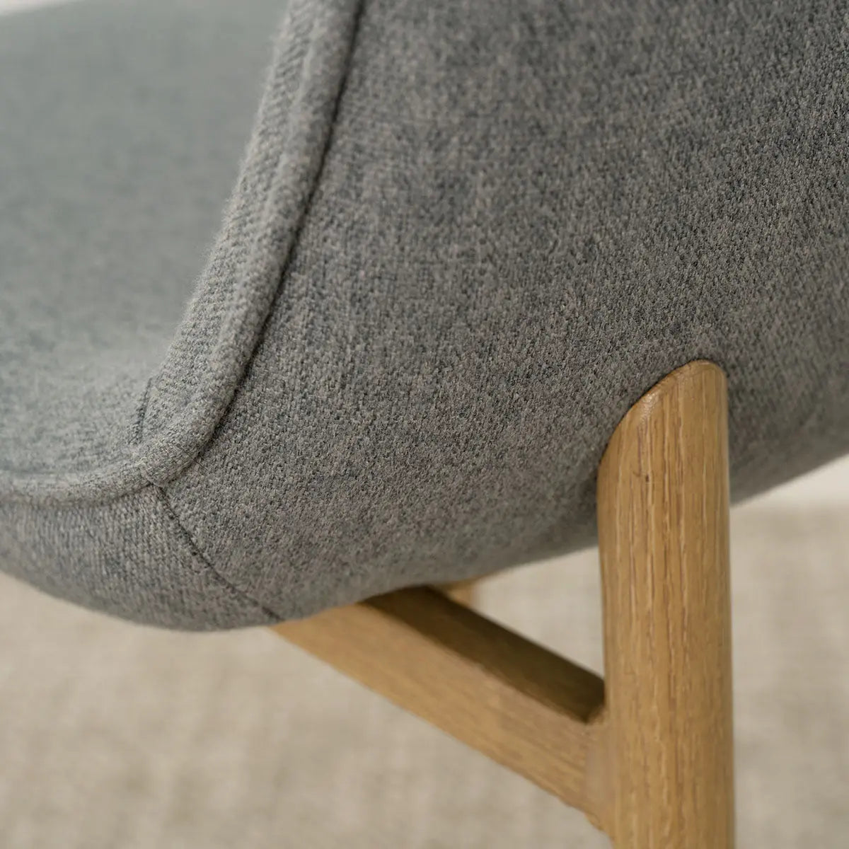 Oslo Modern Chenille Dining Chair detail, featuring oak legs and textured upholstery in neutral tones.