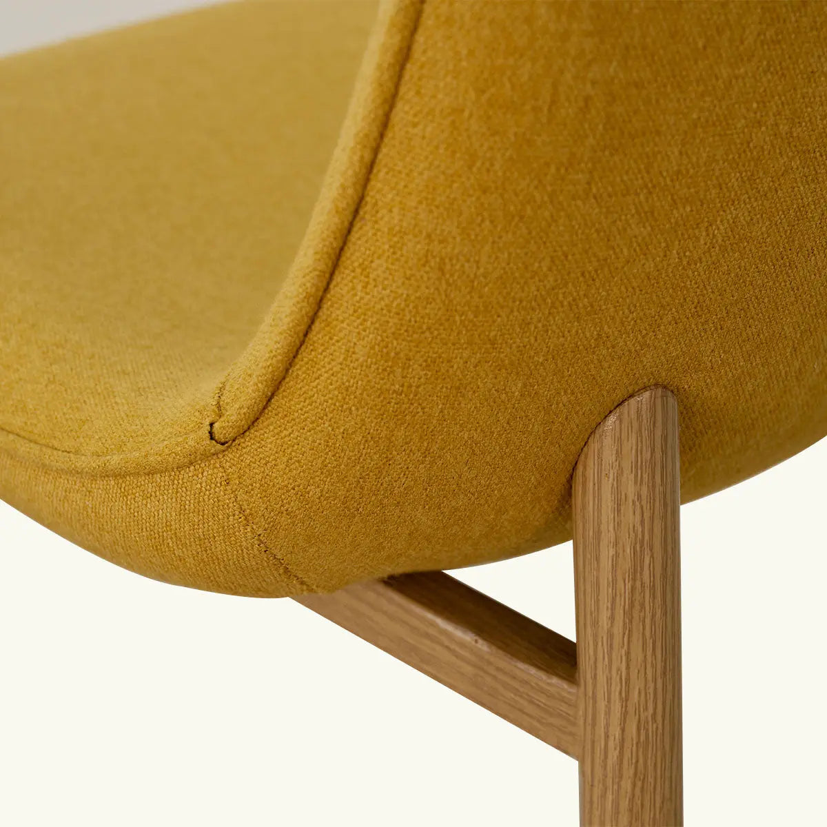 Oslo Modern Chenille Dining Chair; oak legs, mustard fabric, close-up, contemporary design.