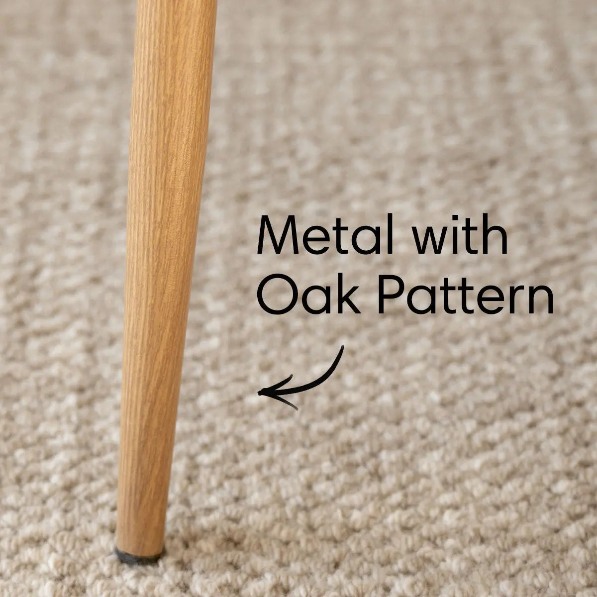 Oslo Modern Chenille Dining Chair's oak-patterned metal leg on textured beige carpeted floor.