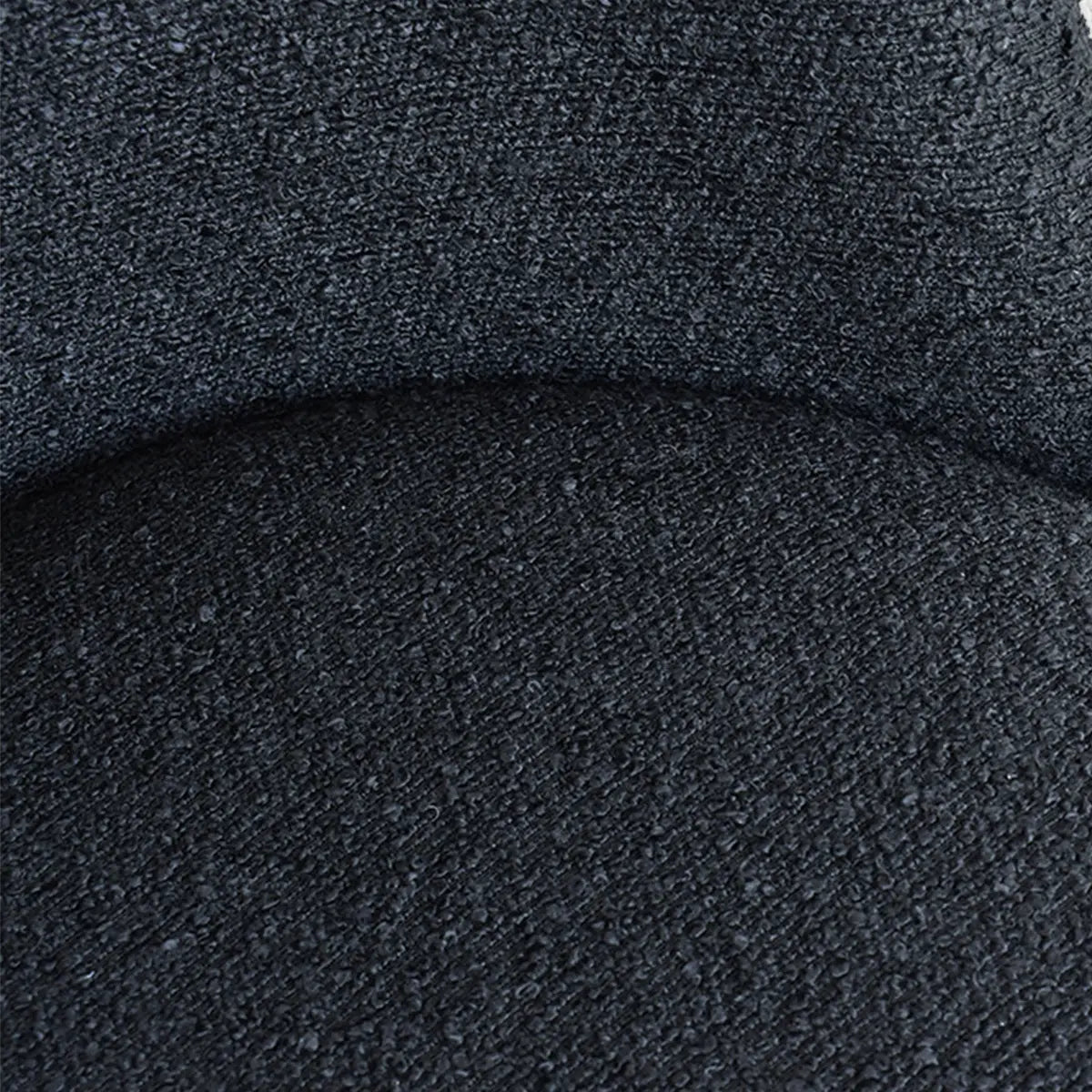 Rhon Modern Boucle Upholstered Dining Chair, close-up, texture detail in dark fabric.