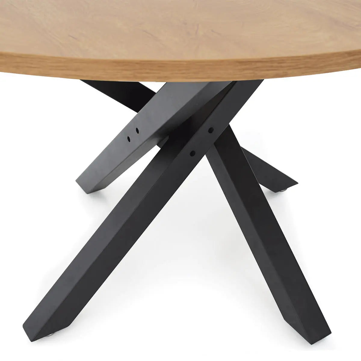 Close-up of Robert Modern Round Dining Table with black metal legs, wooden top.