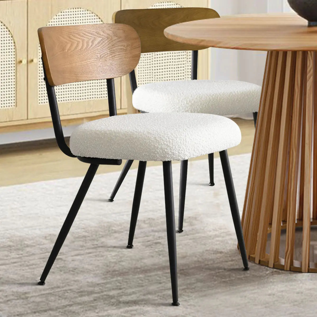 Skagen Beige Boucle Dining Chair, Ash Back with round wood table, light wood cabinet, modern room.