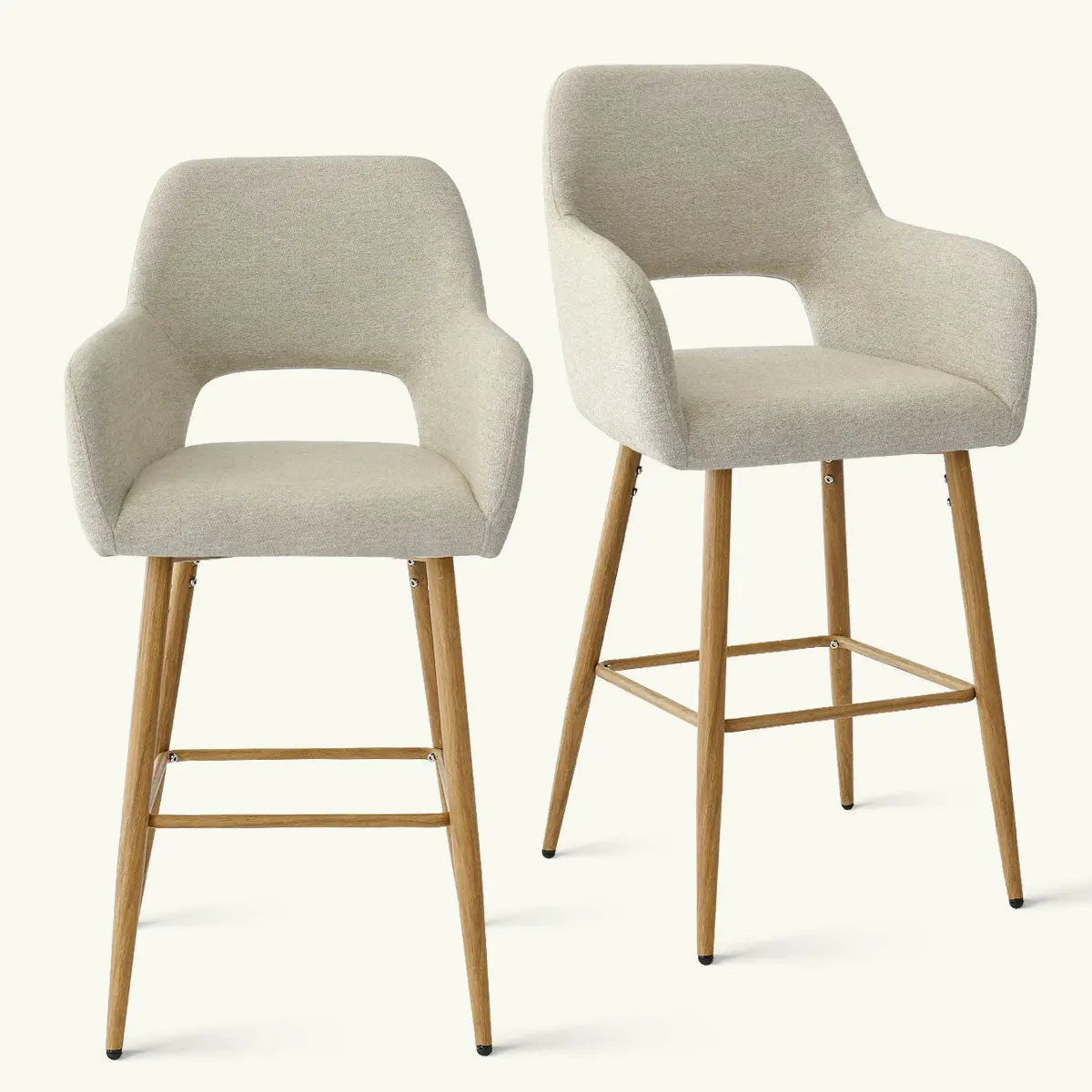 Set of two Atlanta 25.5'' modern upholstered counter stools with wooden legs and armrests.