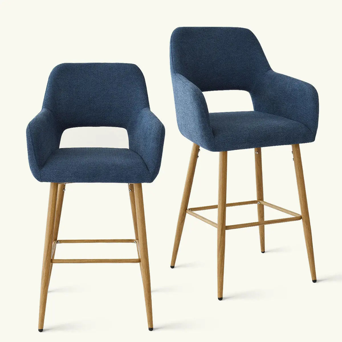 Set of two blue Atlanta Modern Upholstered Counter Stools with Arms on wooden legs.