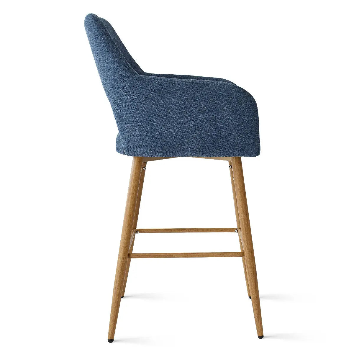 Atlanta Modern Upholstered Counter Stool with Arms, blue fabric, wooden legs, minimalist design, side view.