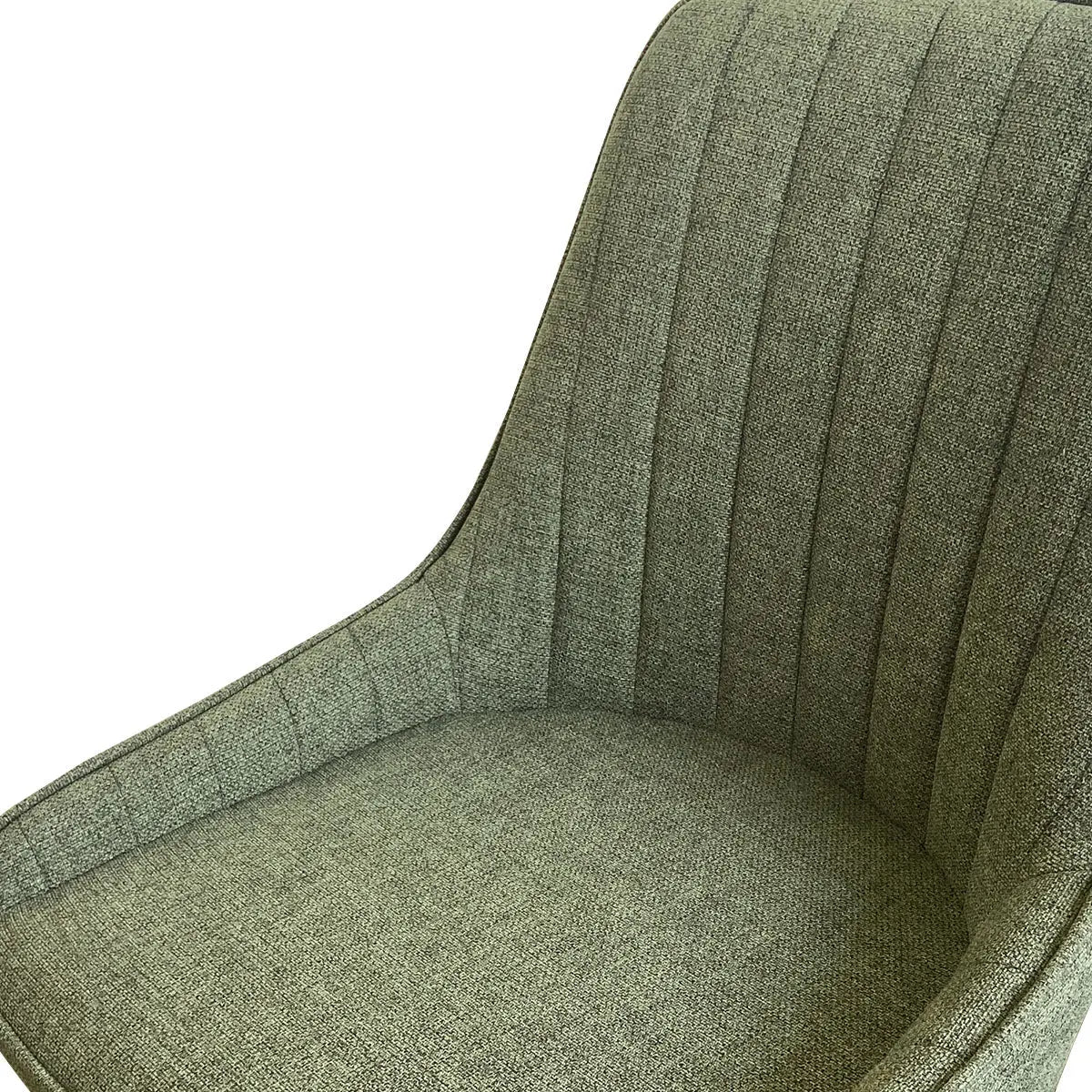 Boston Modern Upholstered Dining Chair in green fabric with channel tufting, close-up view.