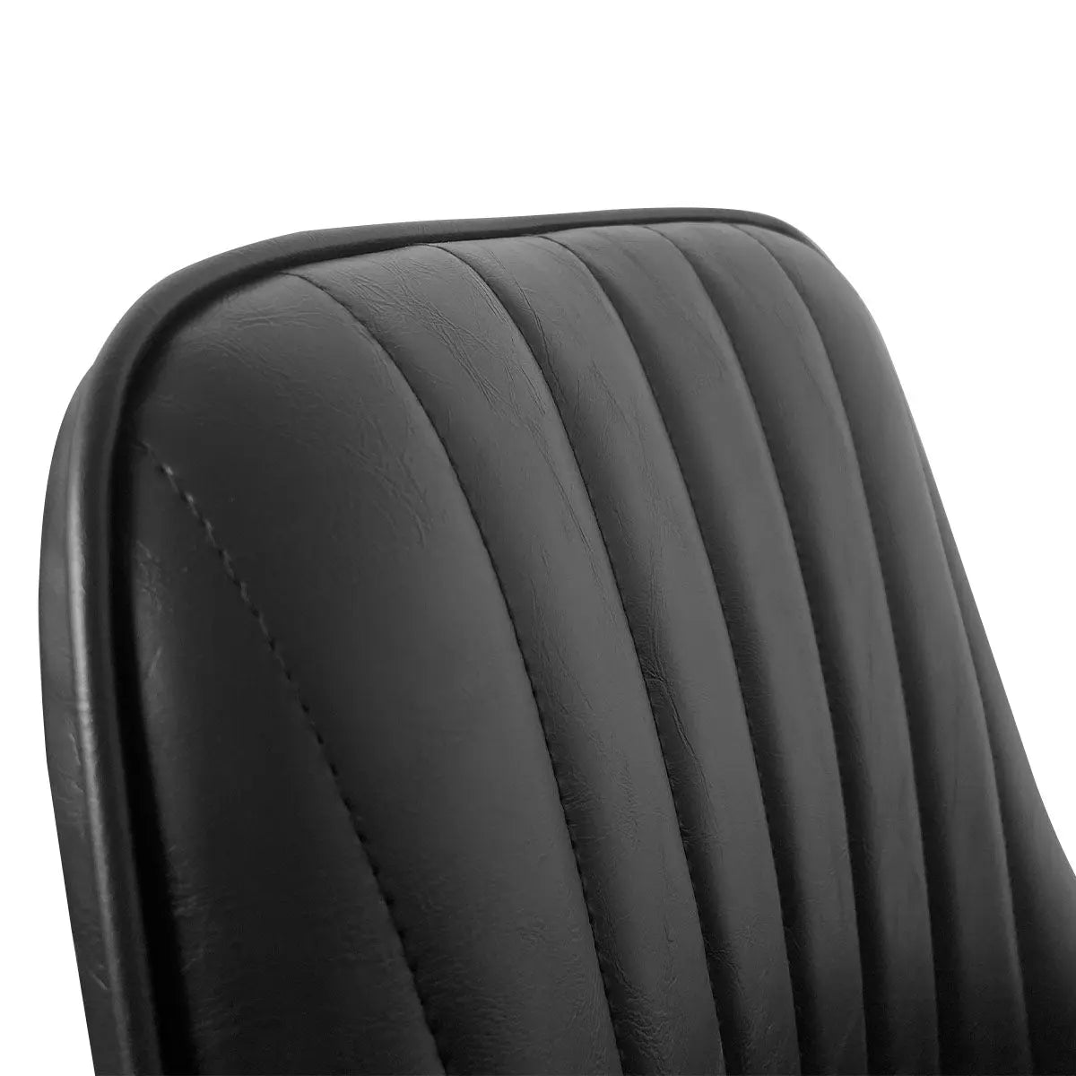 Boston Leather Upholstered Dining Chair, close-up view. Luxurious stitching detail, modern design.