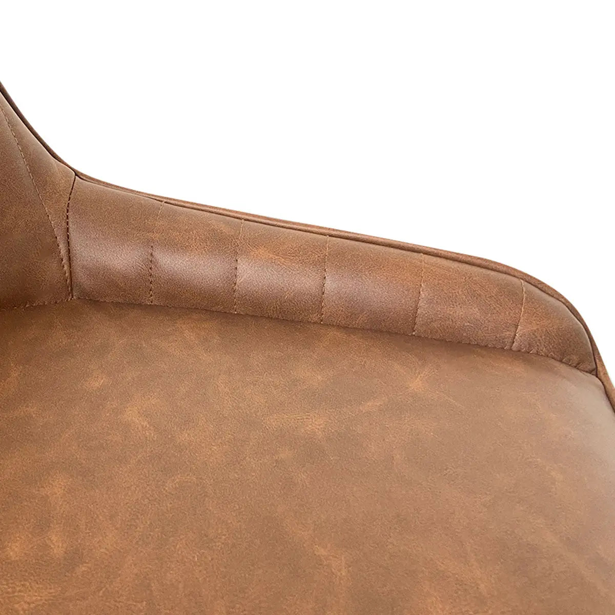 Close-up of brown Boston Leather Upholstered Dining Chair, showcasing detailed stitching and texture.