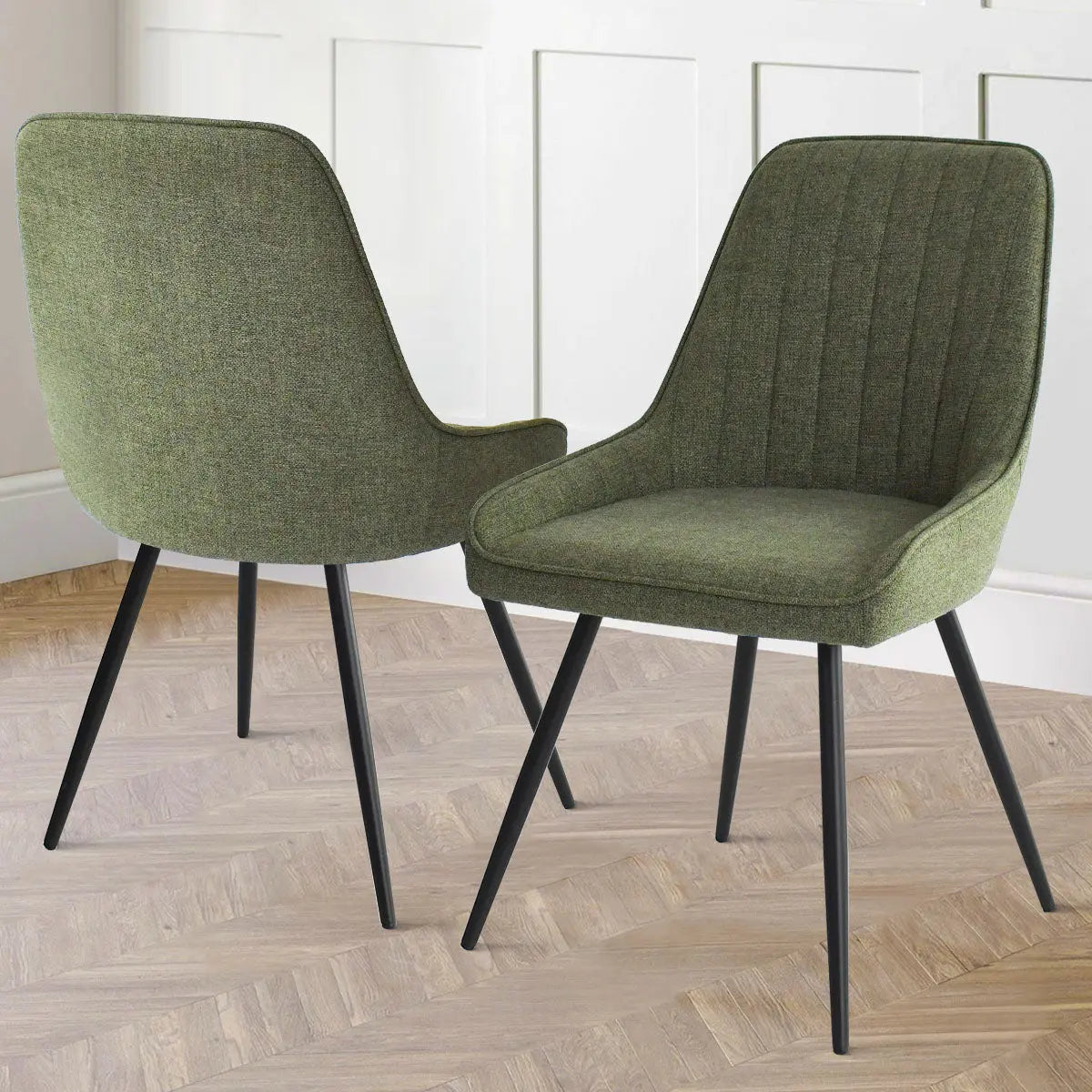 Boston Modern Upholstered Dining Chair set on wooden herringbone flooring in stylish dining area.