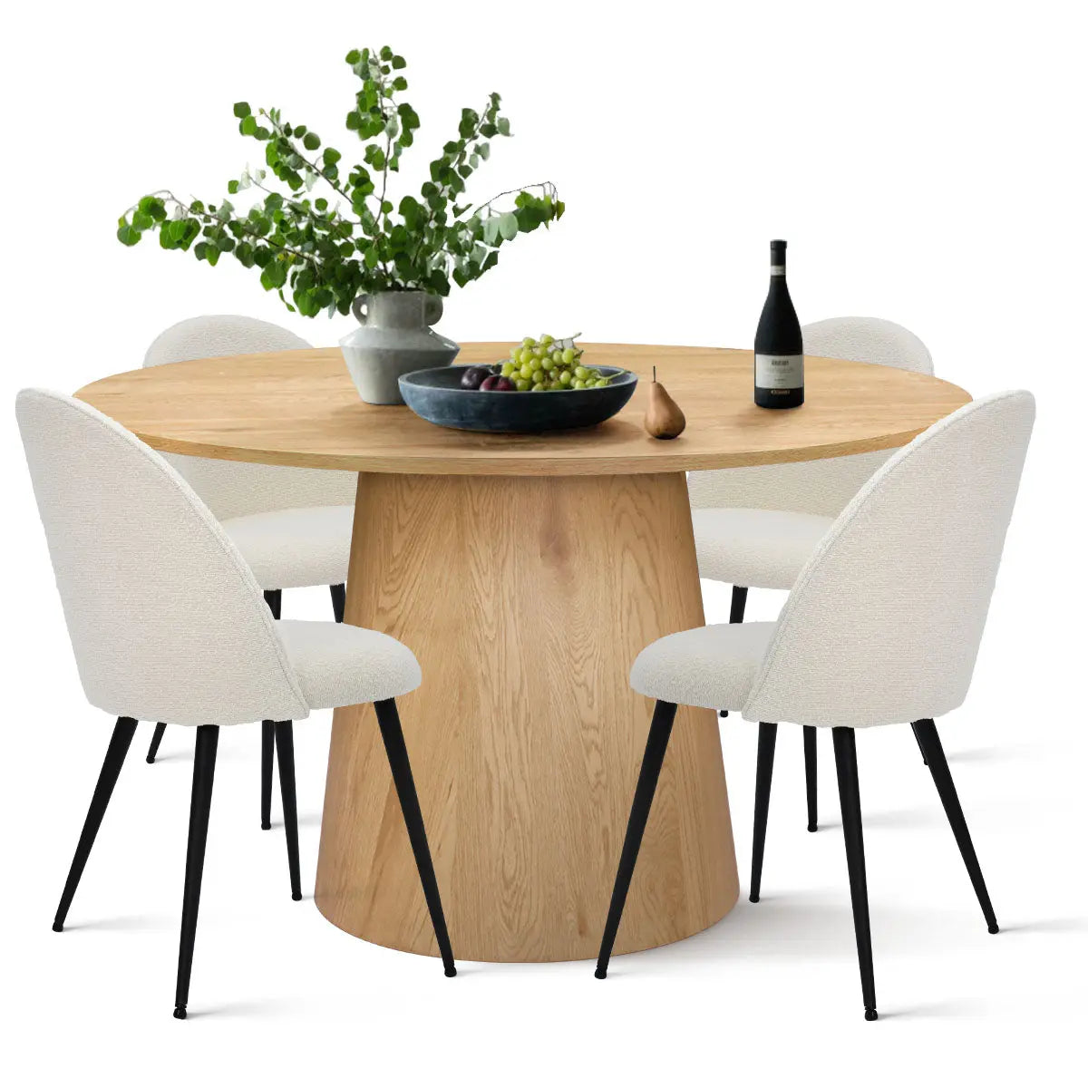 Dwen & Rhon modern round pedestal dining table set with four white fabric chairs and wooden finish.