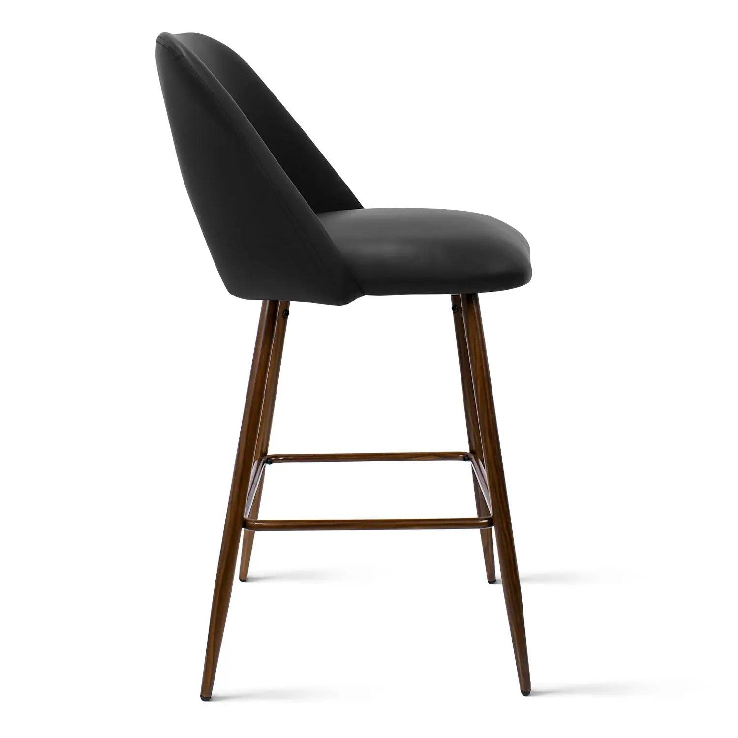 Side view of Edwin Modern Leather Counter Stool, black seat, wooden legs, isolated on white background.