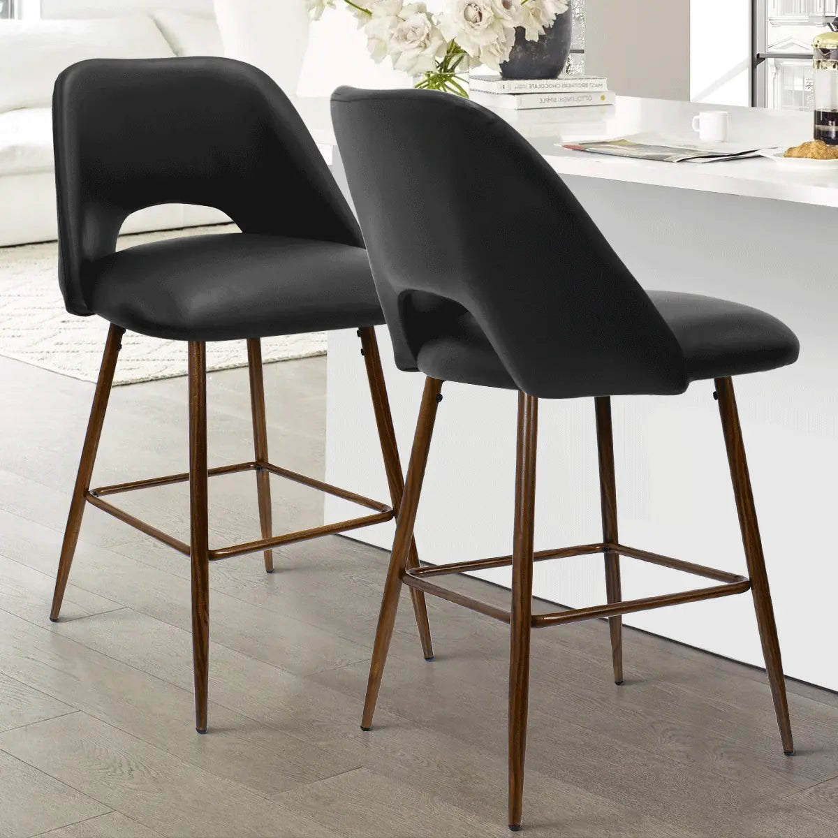 Edwin Modern Leather Counter Stool in kitchen with wood flooring, white counter, and neutral decor.