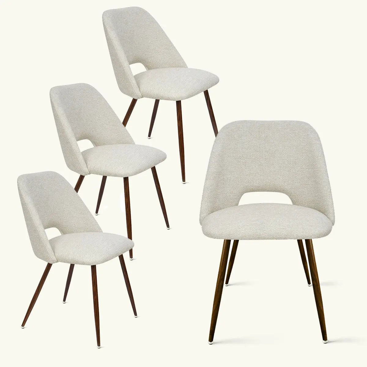 Set of Edwin Modern Boucle Dining Chairs with wooden legs, neutral fabric in dining room setting.