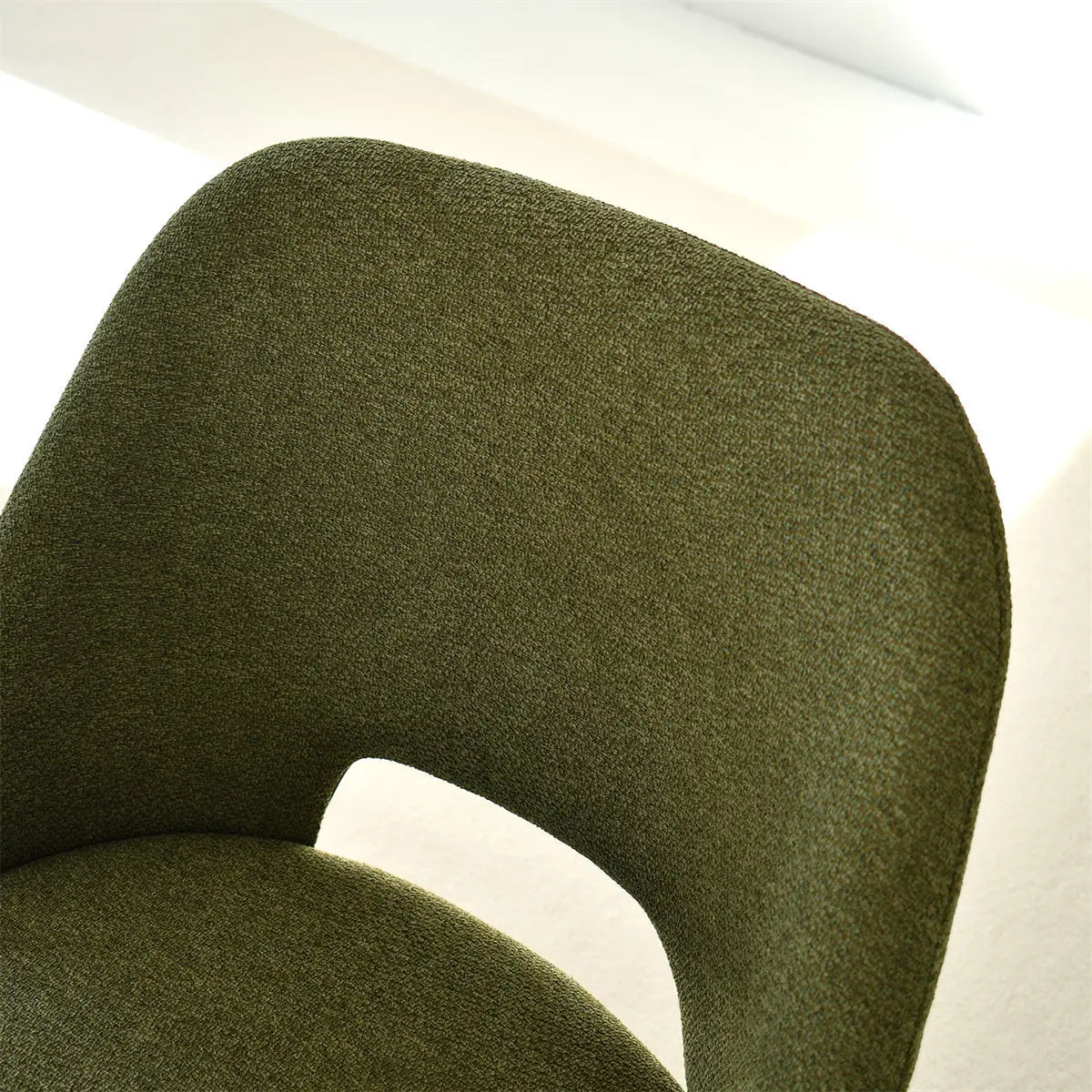 Edwin Modern Boucle Upholstered Dining Chair close-up, green fabric detail, minimalist design.