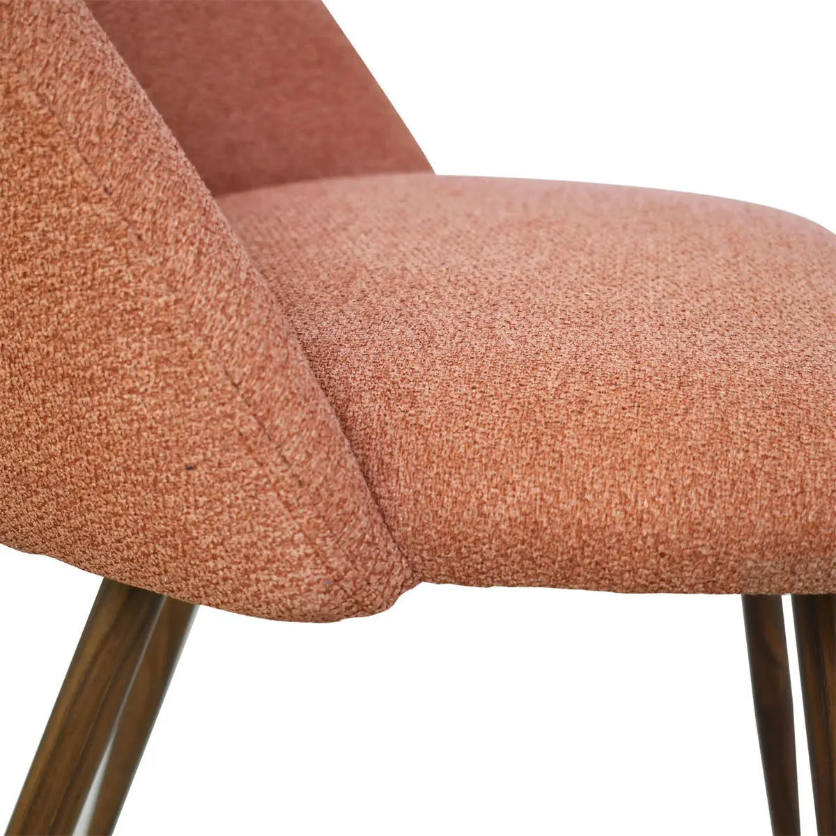 Edwin Boucle Dining Chair with pink upholstery, wooden legs, perfect for modern dining rooms.