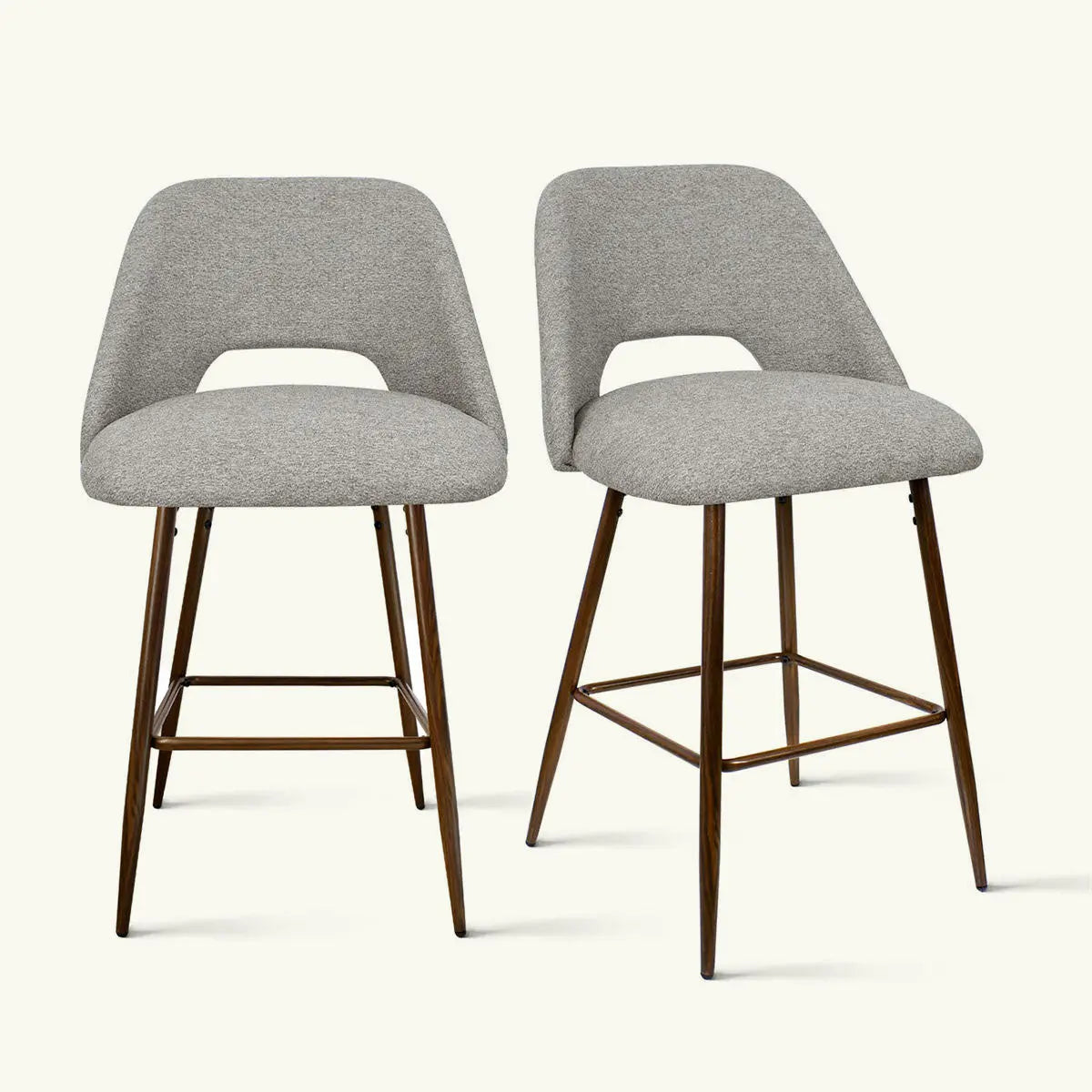 Edwin Modern Upholstered Counter Stool with wood legs; ideal for stylish dining spaces.