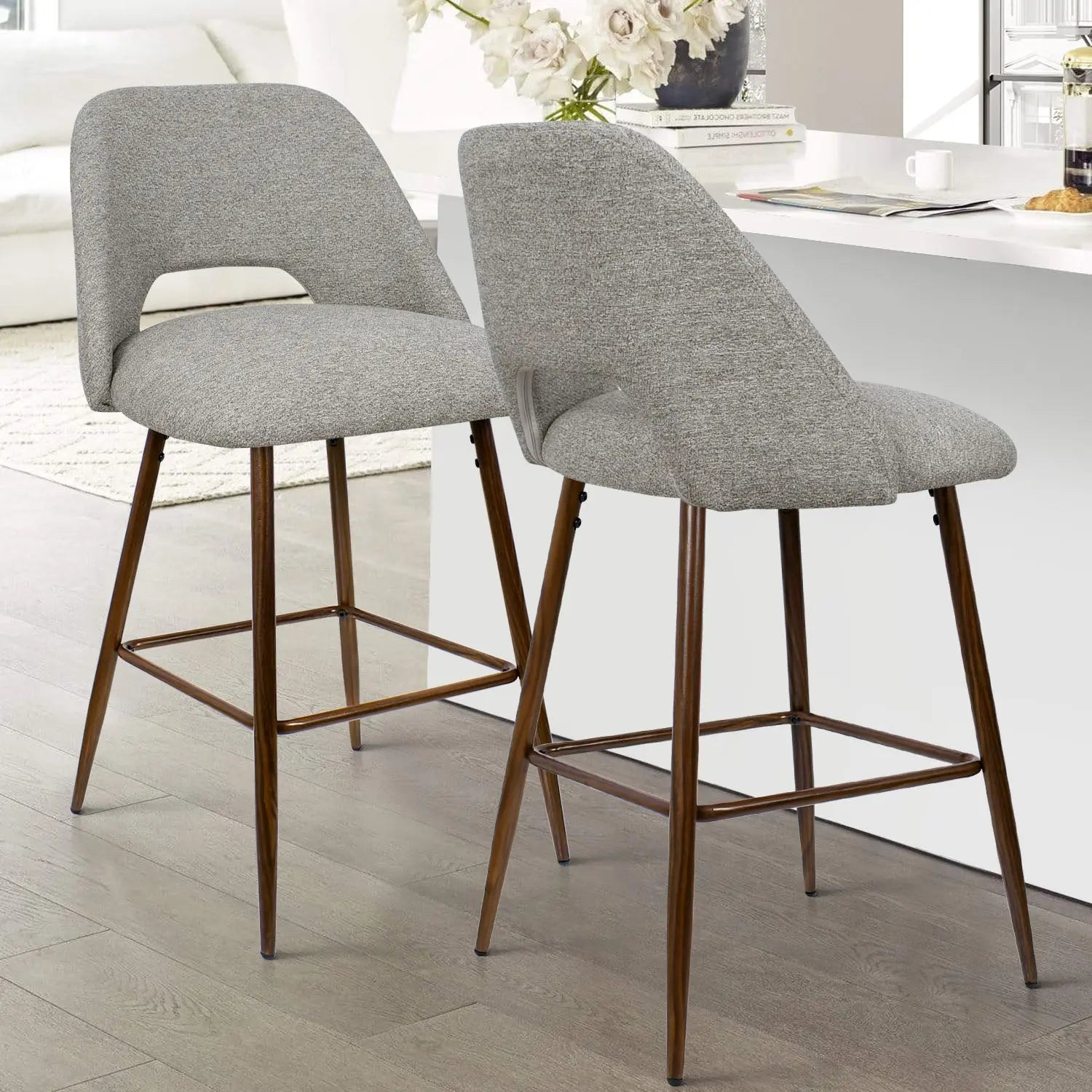 Edwin Modern Upholstered Counter Stool, gray fabric, wooden legs, light wood flooring in kitchen.