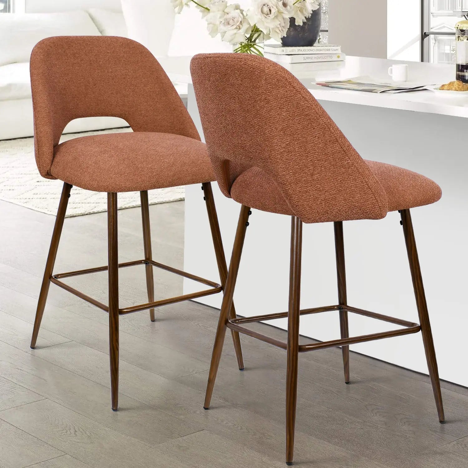 Two Edwin Modern Upholstered Counter Stools in stylish kitchen with light wood flooring and white island.