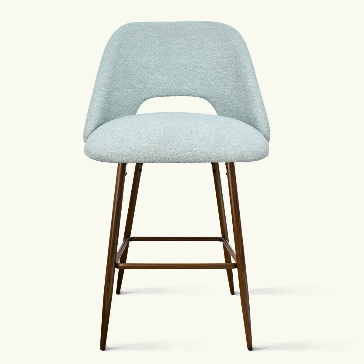 Edwin Modern Upholstered Counter Stool with light blue fabric and wooden legs, neutral background.