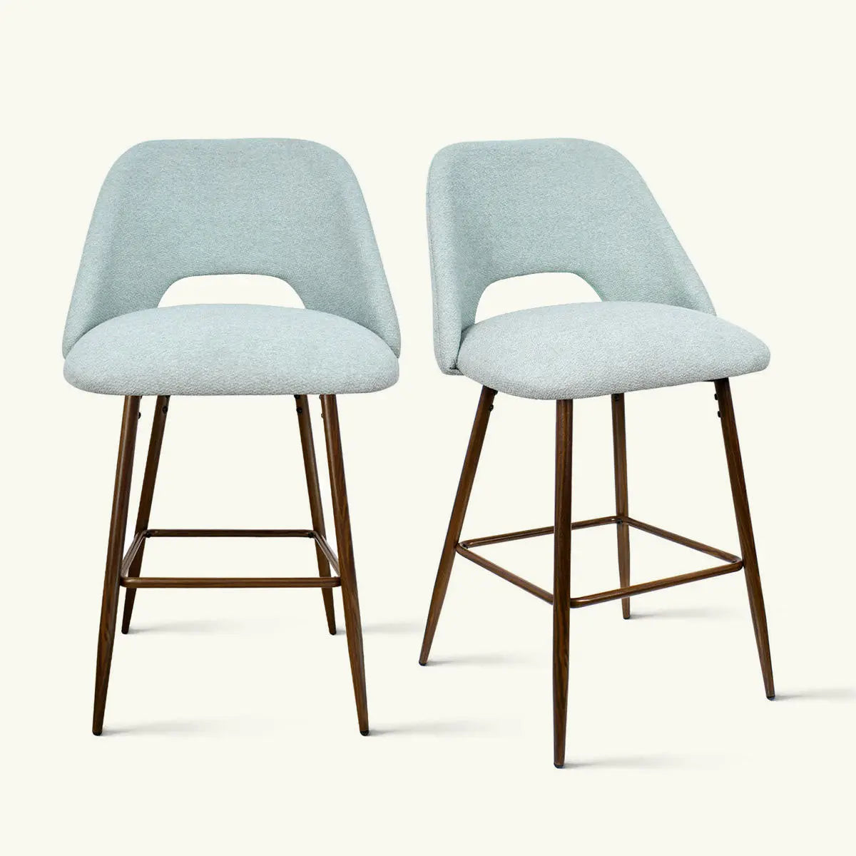 Edwin Modern Upholstered Counter Stool pair with wood legs in neutral room setting.