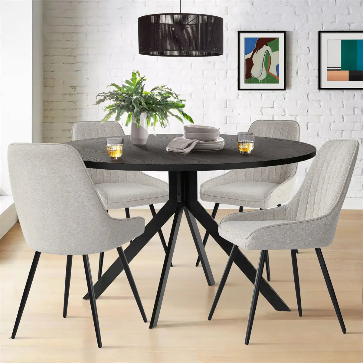 Jonesbo & Boston dining set, white brick wall, light gray chairs, wood floor, modern decor, art.