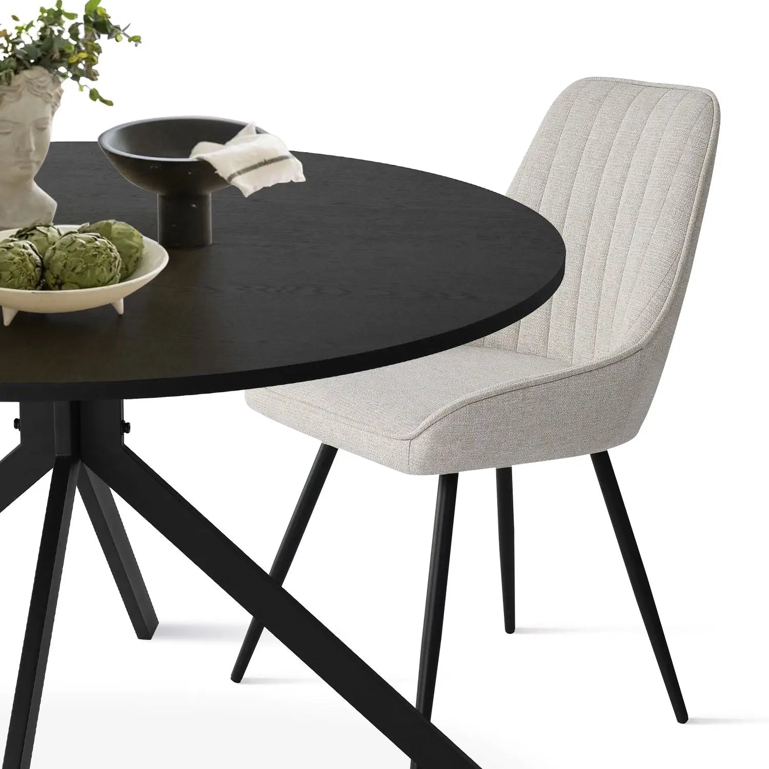 Jonesbo & Boston black round dining table set with gray chair; modern minimalist design.