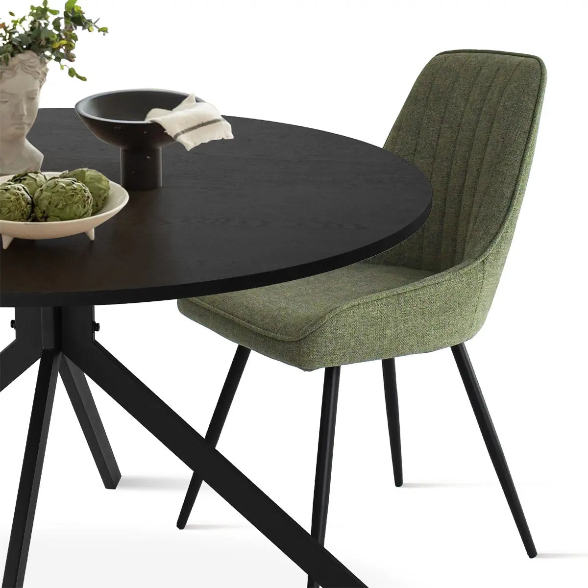 Jonesbo & Boston black dining table set with green chair, modern style, detailed close-up view.