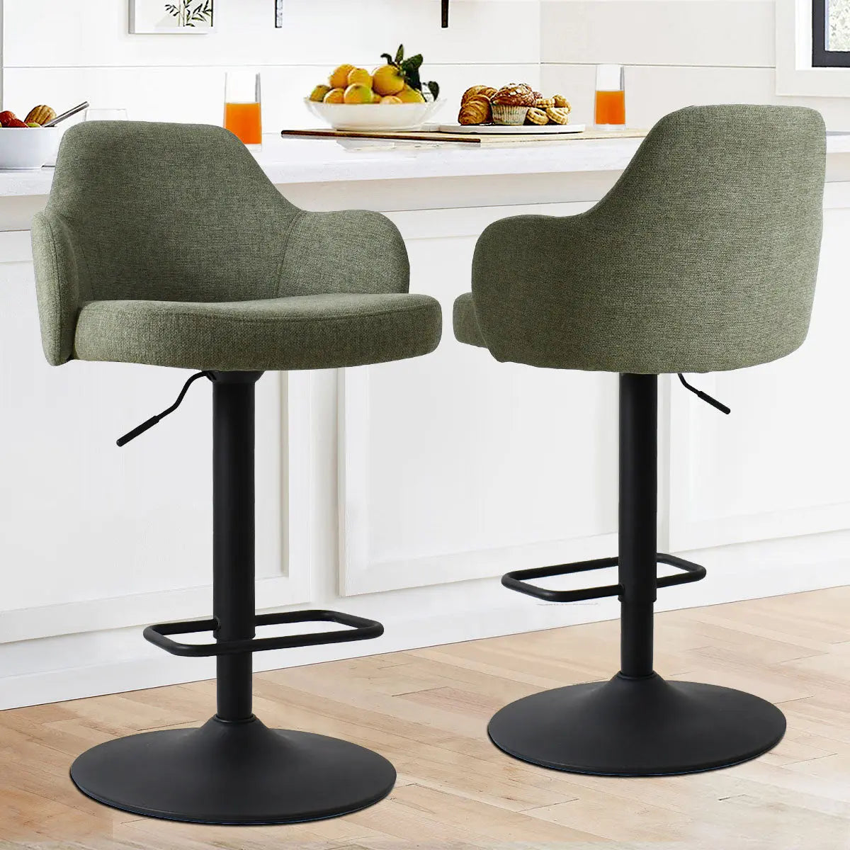 Mars Upholstered Swivel Adjustable Stool with Arms in kitchen, light wood flooring, white cabinets.