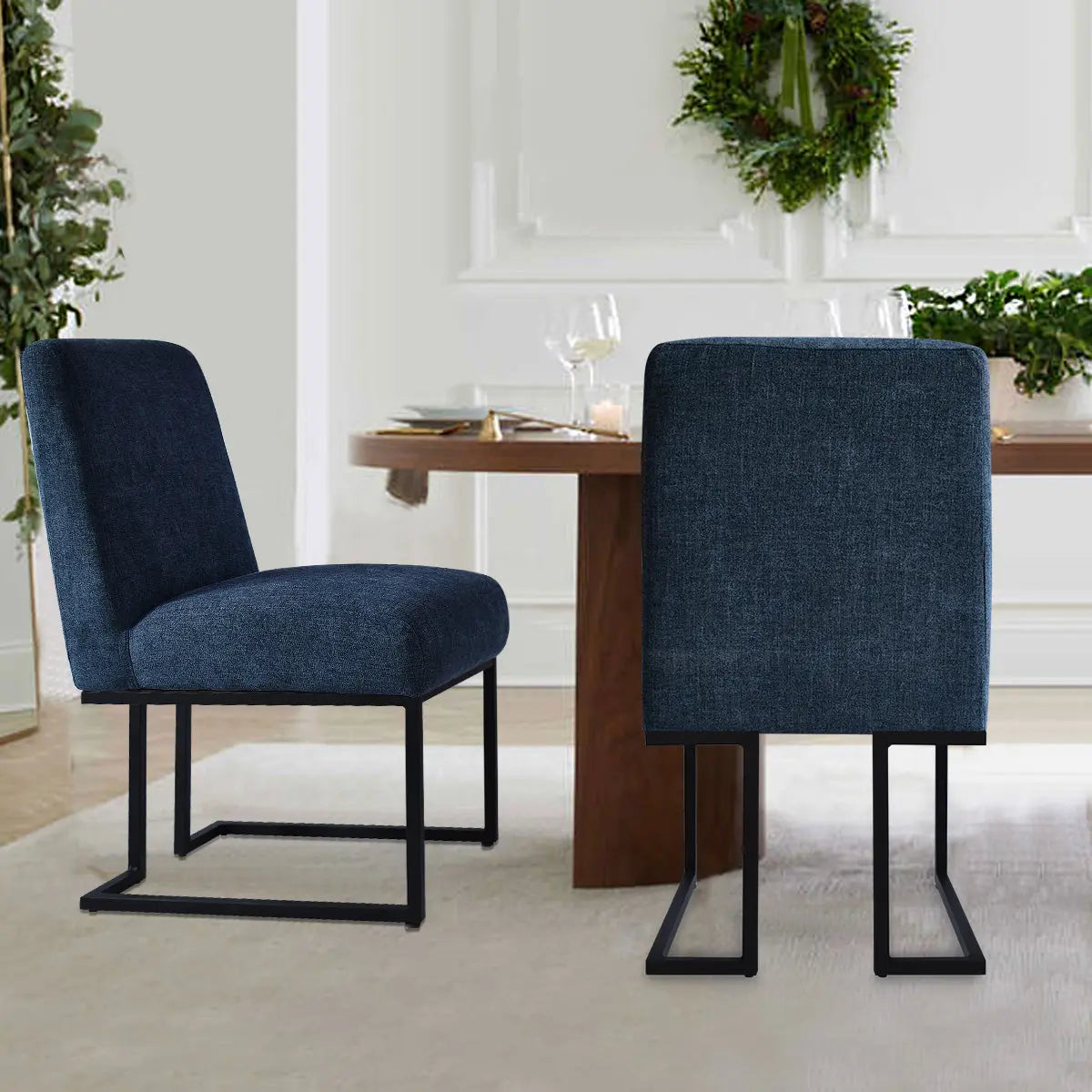 Mason Modern Dining Chair, metal frame, upholstered; shown in stylish dining room with neutral walls.